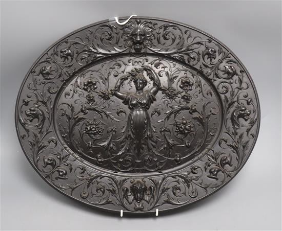 An Elkington style oval cast iron plaque length 48cm